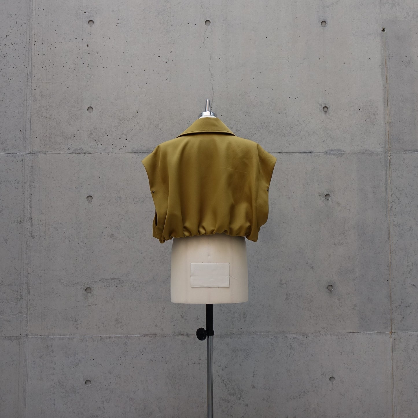 Contemporary Cutout Vest in Golden Olive