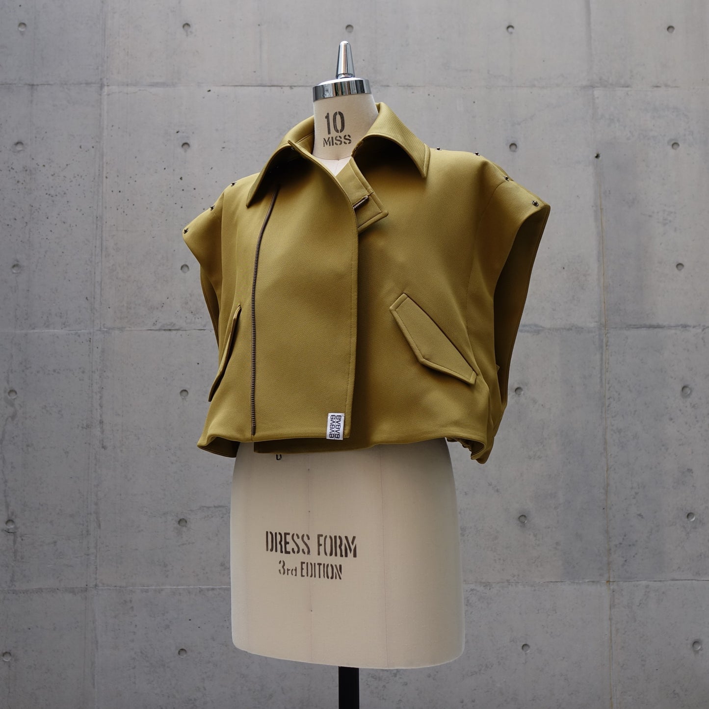 Contemporary Cutout Vest in Golden Olive